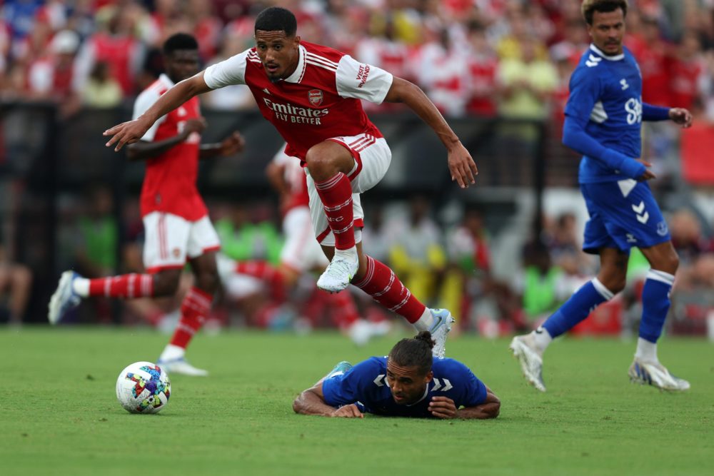 BALTIMORE, MARYLAND: William Saliba #12 of Arsenal and Dominic Calvert-Lewin #9 of Everton go after the ball in the first half during a preseason f...