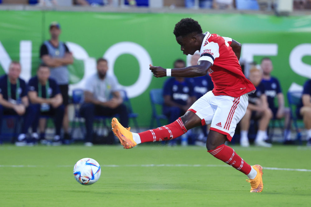 ORLANDO, FLORIDA: Bukayo Saka of Arsenal shoots during the Florida Cup match between Chelsea and Arsenal at Camping World Stadium on July 23, 2022....