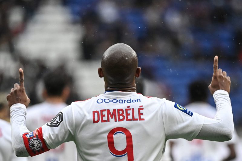 Lyons French forward Moussa Dembele (C) celebrates after scoring a goal during the French L1 football match between Olympique Lyonnais (OL) and Mon...
