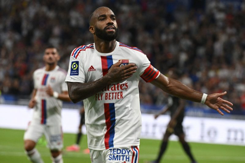 TOPSHOT - Lyon's French forward Alexandre Lacazette celebrates after scoring his team's second goal during the French Ligue 1 football match betwee...