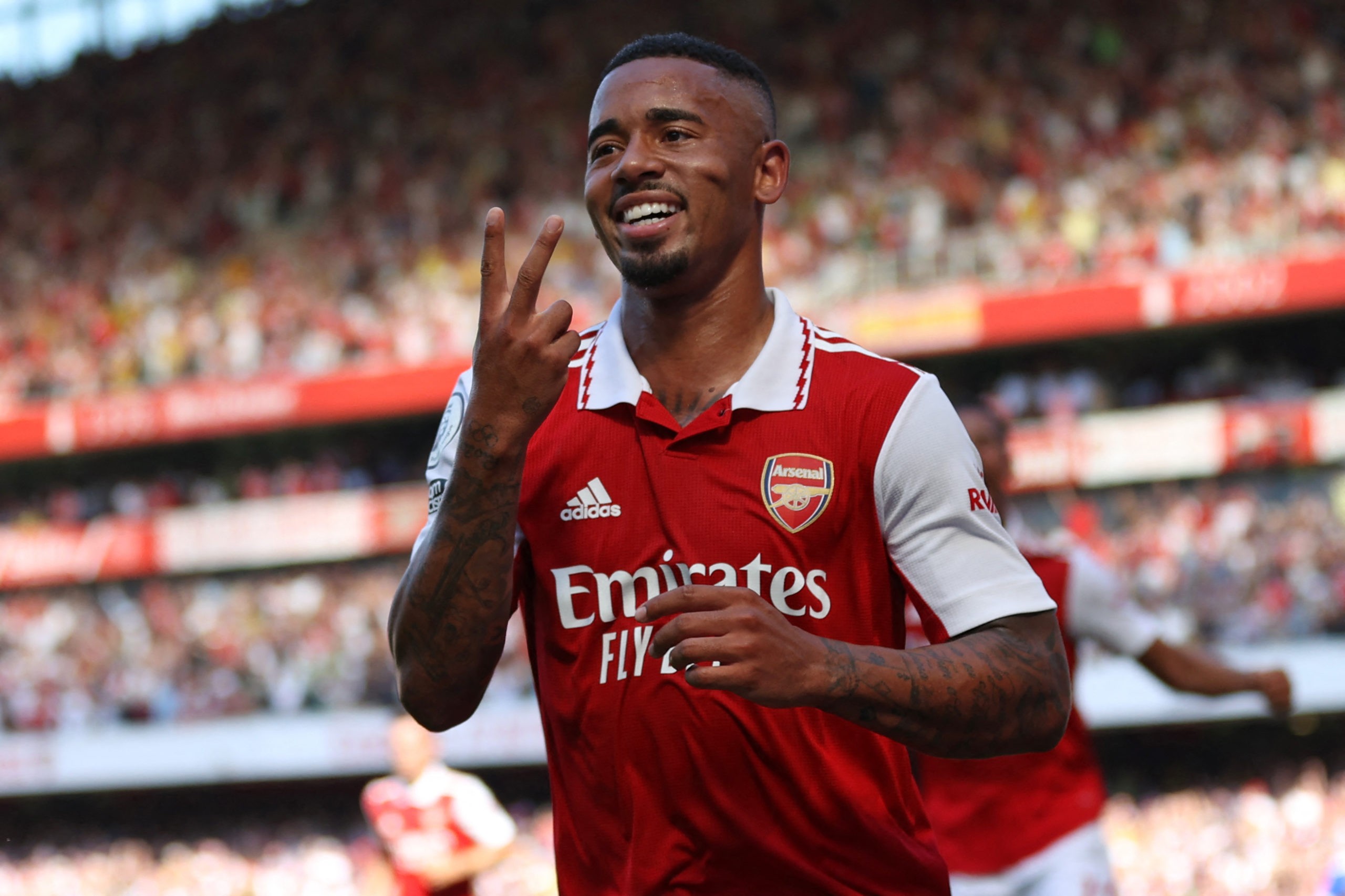 Arsenal's Brazilian striker Gabriel Jesus celebrates after scoring their second goal during the English Premier League football match between Arsen...