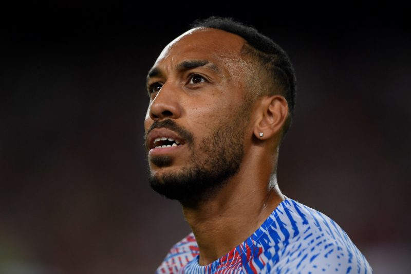 Barcelona's Gabonese midfielder Pierre-Emerick Aubameyang looks on before the start of the friendly football match between FC Barcelona and Manches...