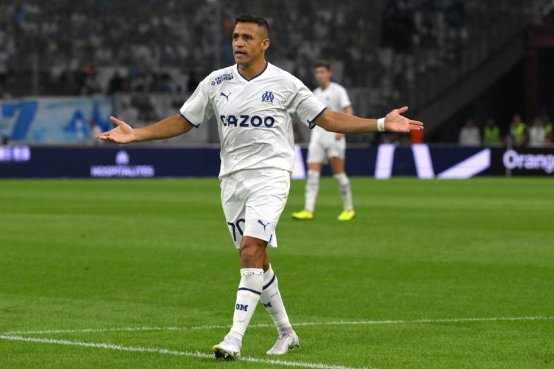 Marseille's Chilean forward Alexis Sanchez reacts during the French L1 football match between Olympique Marseille (OM) and FC Nantes at Stade Velodrome in Marseille, southern France on August 20, 2022. (Photo by NICOLAS TUCAT / AFP) 