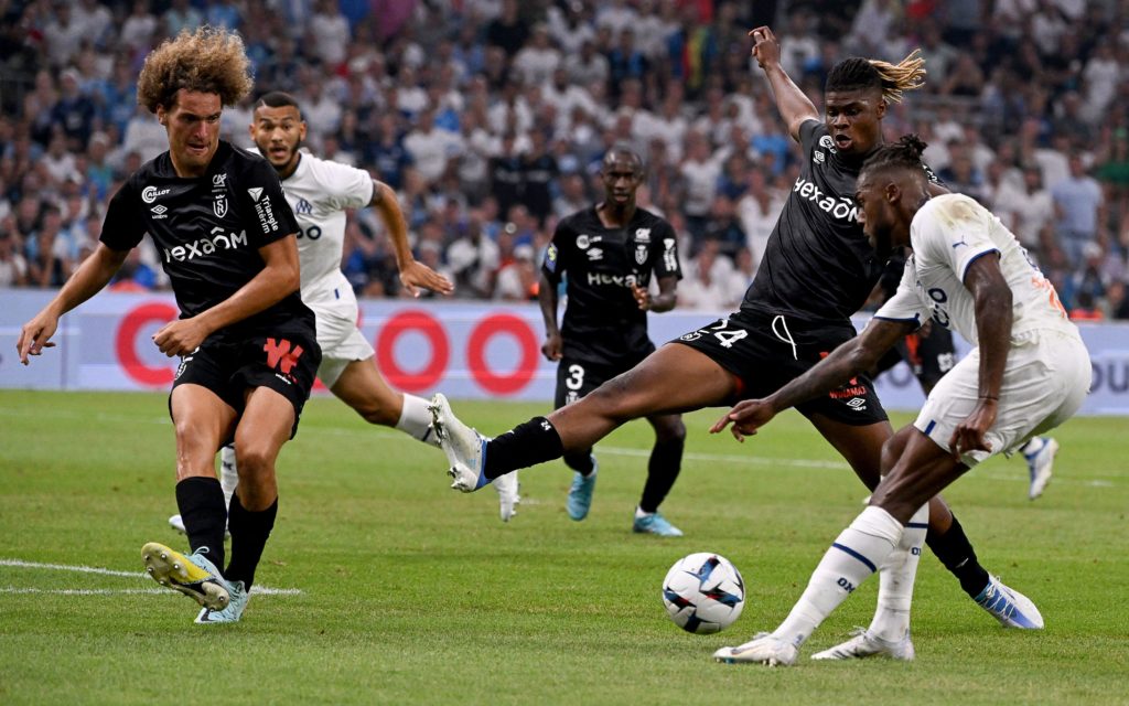 3 goals, 1 clean sheet, 6 debuts: Arsenal weekend loan roundup 4 Marseille's Portuguese midfielder Nuno Tavares (R) fights for the ball with Reims' Ivorian defender Emmanuel Agbadou (C) and Reims' Belgian defender Wout Faes (L) during the French L1 football match between Olympique de Marseille (OM) and Stade de Reims at the Stade Velodrome in Marseille, southeastern France, on August 7, 2022. (Photo by PASCAL GUYOT/AFP via Getty Images)