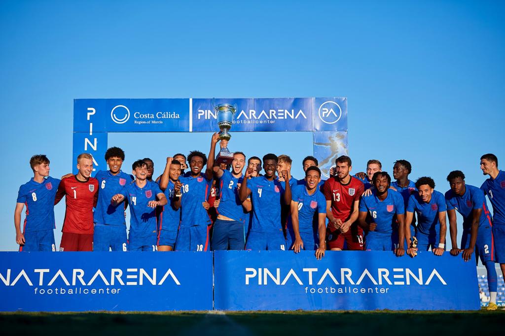 Charlie Patino celebrating with the England u20s lifting the trophy at the Pinatar Arena (Photo via PinatarArena.com)