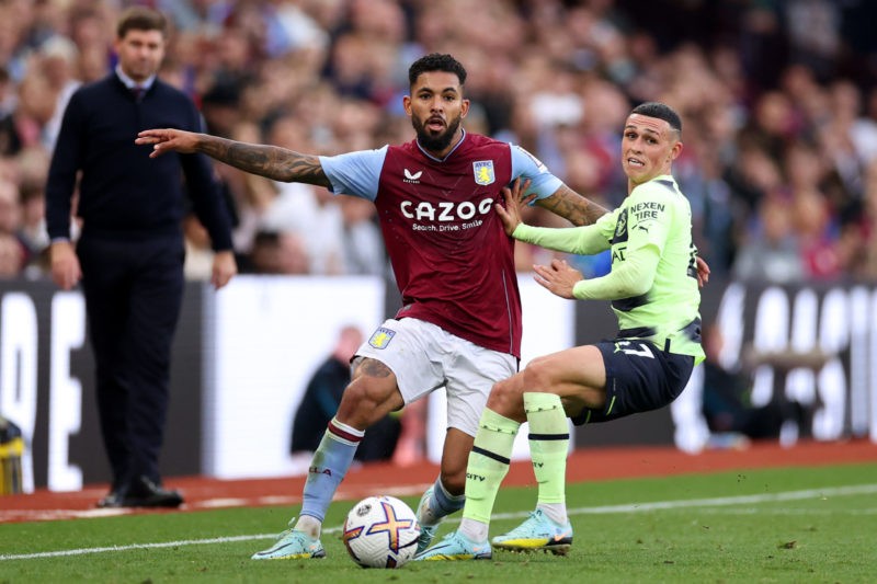 BIRMINGHAM, ENGLAND - SEPTEMBER 03: Phil Foden of Manchester City battles for possession with Douglas Luiz of Aston Villa during the Premier League...