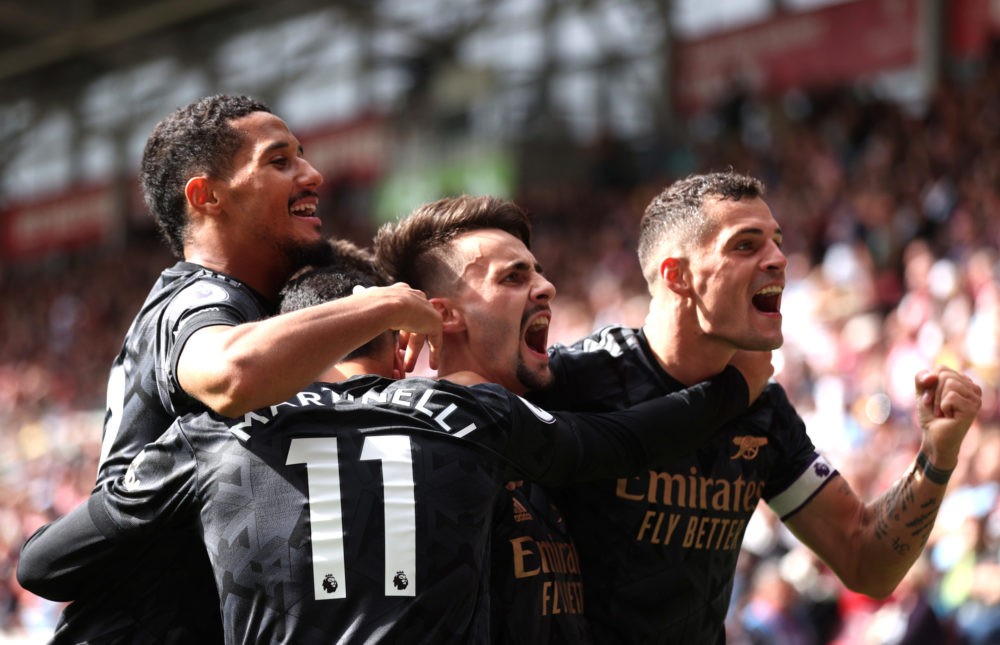 BRENTFORD, ENGLAND: Fabio Viera of Arsenal celebrates after scoring their side's third goal with Granit Xhaka during the Premier League match betwe...
