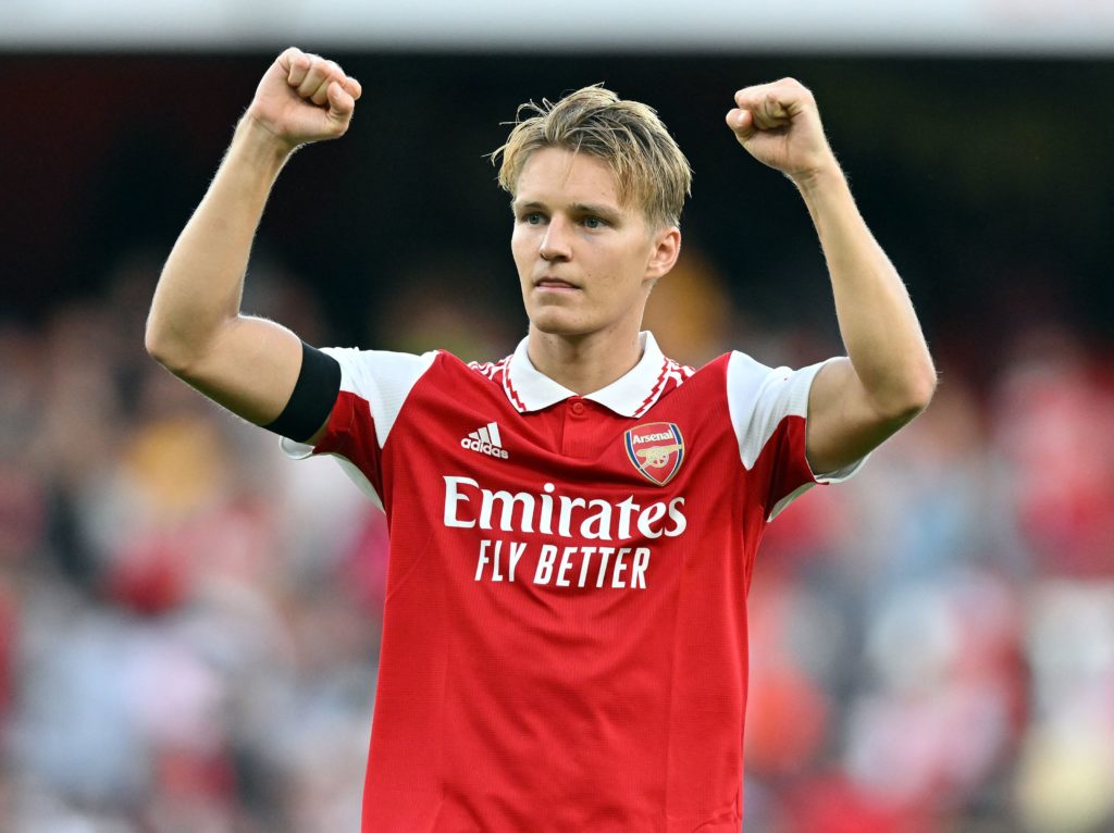 Arsenal's Norwegian midfielder Martin Odegaard celebrates after the English Premier League football match between Arsenal and Fulham at the Emirates Stadium in London on August 27, 2022. (Photo by GLYN KIRK/AFP via Getty Images)