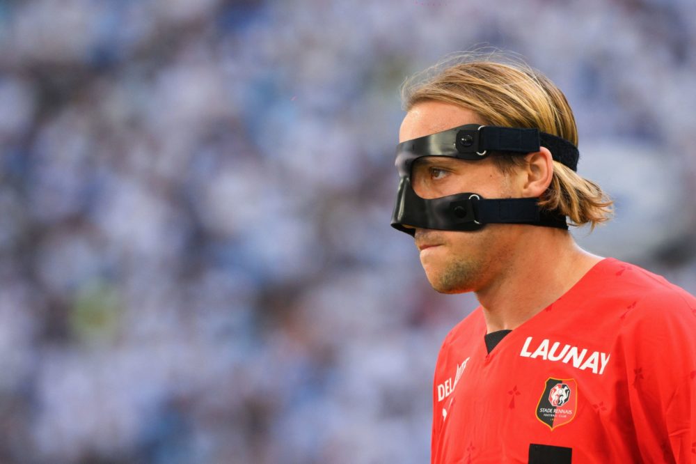 Rennes' Croatian midfielder Lovro Majer wearing a protective face mask looks on during the French L1 football match between Olympique Marseille (OM...