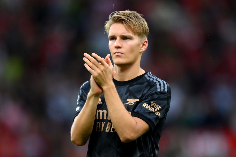 MANCHESTER, ENGLAND - SEPTEMBER 04: Martin Oedegaard of Arsenal applauds fans after the Premier League match between Manchester United and Arsenal ...