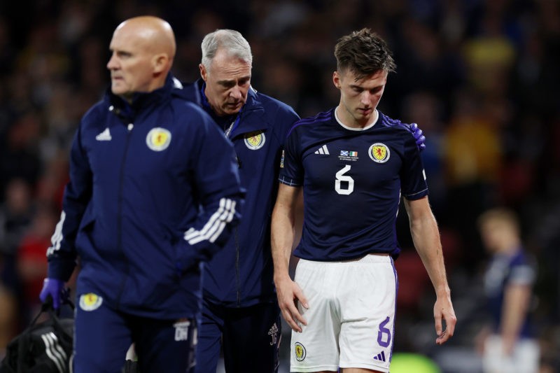 GLASGOW, SCOTLAND - SEPTEMBER 24: Kieran Tierney of Scotland leaves the field after recieving medical treatment during the UEFA Nations League Leag...