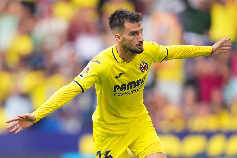 VALENCIA, SPAIN: Alex Baena of Villarreal CF celebrates after scoring their team's first goal during the LaLiga Santander match between Villarreal ...