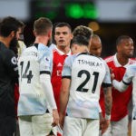 LONDON, ENGLAND - OCTOBER 09: Jordan Henderson of Liverpool clashes with Granit Xhaka of Arsenal after a penalty was given to Arsenal during the Premier League match between Arsenal FC and Liverpool FC at Emirates Stadium on October 09, 2022 in London, England. (Photo by Shaun Botterill/Getty Images)