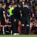 LONDON, ENGLAND - OCTOBER 09: Referee Michael Oliver speaks to Juergen Klopp, Manager of Liverpool and Mikel Arteta, Manager of Arsenal after an on field incident during the Premier League match between Arsenal FC and Liverpool FC at Emirates Stadium on October 09, 2022 in London, England. (Photo by Justin Setterfield/Getty Images)