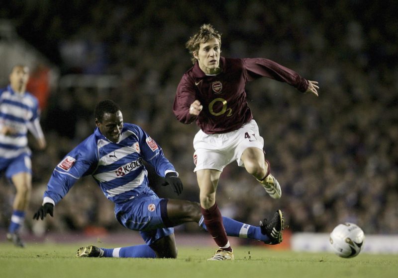 LONDON - NOVEMBER 29: Arturo Lupoli of Arsenal (R) in action as Ibrahima Sonko of Reading defends during the Carling Cup fourth round match between...