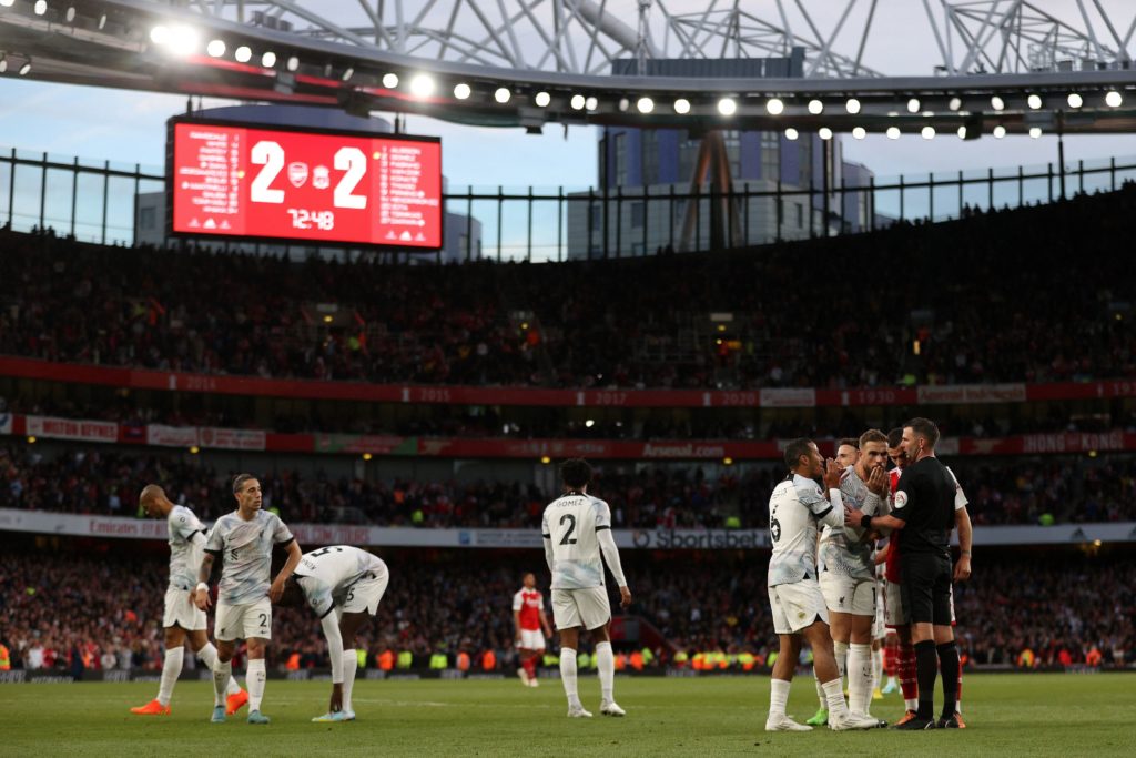 Referee named for Arsenal clash with Manchester City 4 Liverpool's Spanish midfielder Thiago Alcantara (4R) and Liverpool's English midfielder Jordan Henderson (3R) appeal to Referee Michael Oliver after Arsenal were awarded a penalty during the English Premier League football match between Arsenal and Liverpool at the Emirates Stadium in London on October 9, 2022. (Photo by ADRIAN DENNIS/AFP via Getty Images)