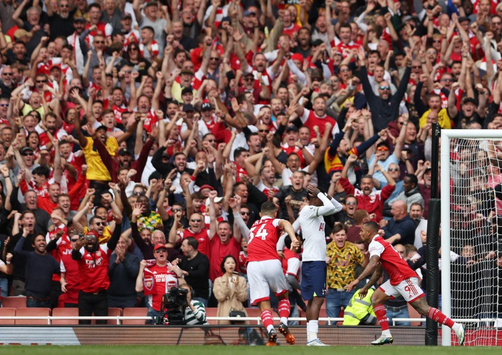 Arsenal's Brazilian striker Gabriel Jesus (R) celebrates scoring his team's second goal during the English Premier League football match between Arsenal and Tottenham Hotspur at the Emirates Stadium in London on October 1, 2022. (Photo by ADRIAN DENNIS/AFP via Getty Images)