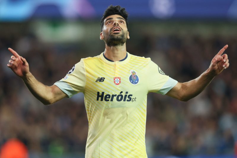 FC Porto's Iranian forward Mehdi Taremi celebrates after scoring the opening goal during the UEFA Champions League Group B second leg football match between Club Brugge KV and FC Porto at the Jan Breydel Stadium in Bruges on October 26, 2022. (Photo by BRUNO FAHY/BELGA/AFP via Getty Images)