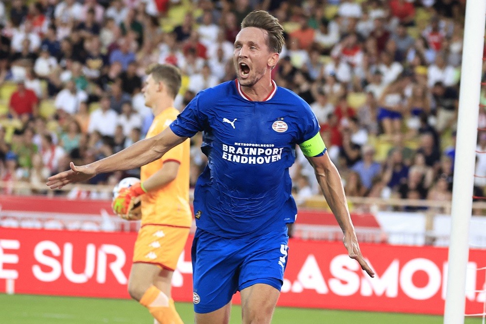 PSV player admits they'll change tactics against Arsenal 2 PSV Eindhoven's Dutch forward Luuk De Jong celebrates after midfielder Joey Veerman scored a goal during the UEFA Champions League third qualifying round first leg football match between AS Monaco and PSV Eindhoven at the "Louis II Stadium" in Monaco on August 2, 2022. (Photo by VALERY HACHE/AFP via Getty Images)