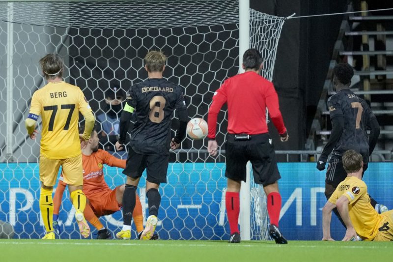 No excuse: Arteta and Saka agree on Bodo/Glimt pitch after tough win 3 Arsenal's English midfielder Bukayo Saka (2R) scores a goal past Bodo/Glimt's Russian goalkeeper Nikita Khaikin during the UEFA Europa League Group A football match between FK Bodoe/Glimt and Arsenal FC in Bodo, Norway on October 13, 2022. - Norway OUT (Photo by Fredrik Varfjell / NTB / AFP) / Norway OUT (Photo by FREDRIK VARFJELL/NTB/AFP via Getty Images)