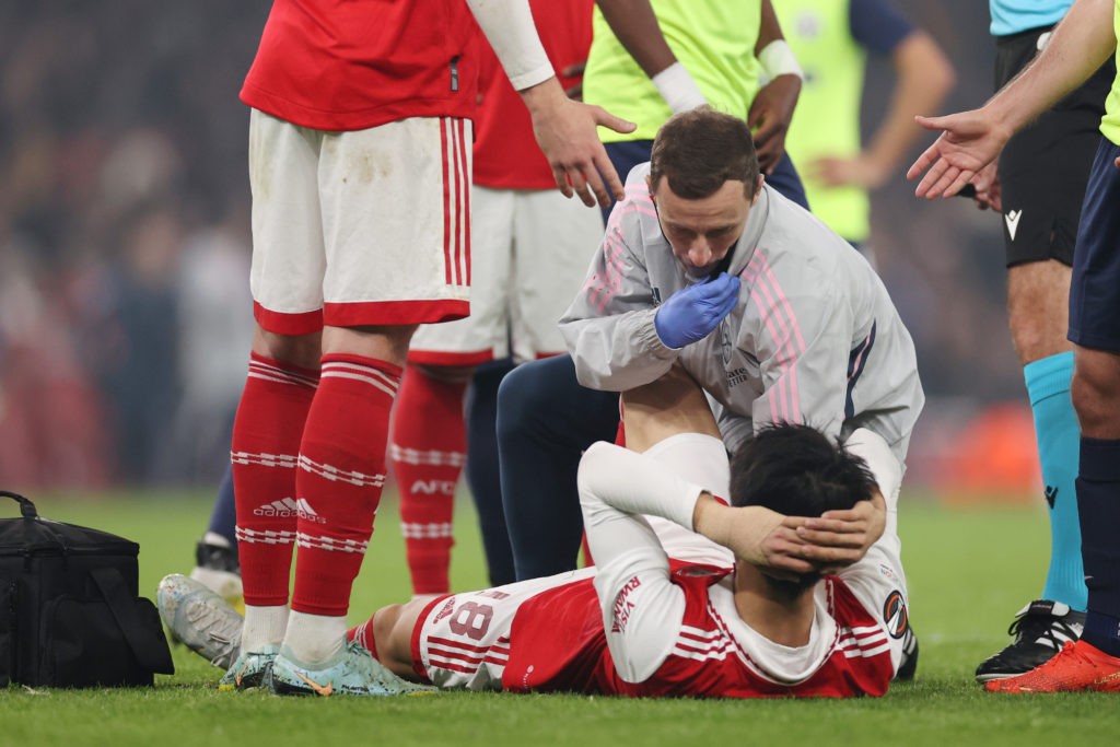 World Cup Arsenal 24yo given injury comeback timeframe 2 LONDON, ENGLAND - NOVEMBER 03: Takehiro Tomiyasu of Arsenal is seen injured before being substituted off during the UEFA Europa League group A match between Arsenal FC and FC Zürich at Emirates Stadium on November 03, 2022 in London, England. (Photo by Ryan Pierse/Getty Images)