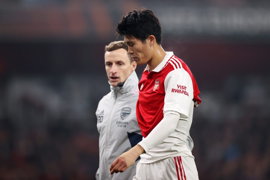 LONDON, ENGLAND - NOVEMBER 03: Takehiro Tomiyasu of Arsenal reacts while leaving the pitch injured during the UEFA Europa League group A match between Arsenal FC and FC Zürich at Emirates Stadium on November 03, 2022 in London, England. (Photo by Ryan Pierse/Getty Images)