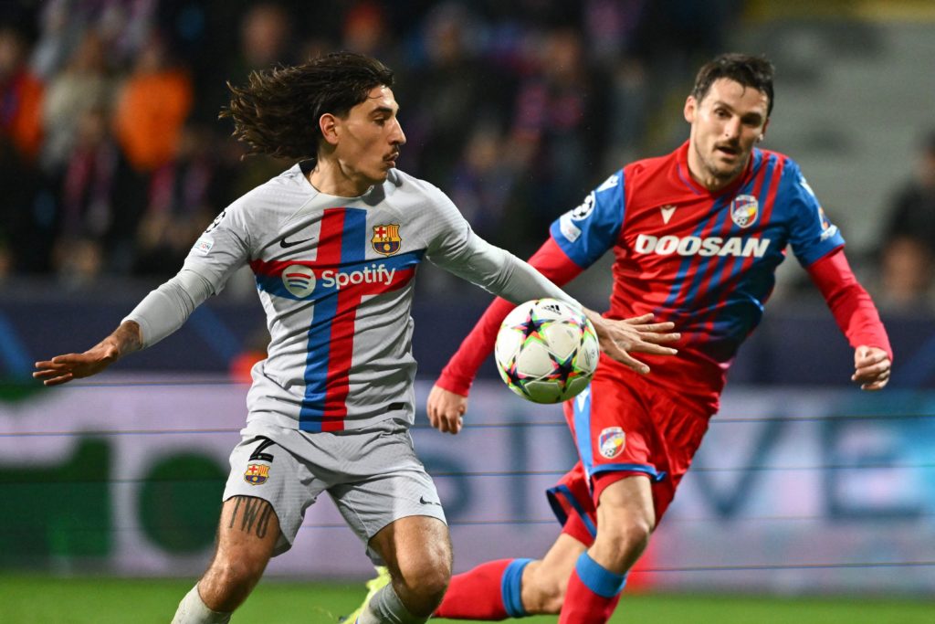 Viktoria Plzen's Czech defender Milan Havel (R) and Barcelona's Spanish defender Hector Bellerin vie for the ball during the UEFA Champions League Group C football match FC Viktoria Plzen v FC Barcelona in Plzen, Czech Republic, on November 1, 2022. (Photo by JOE KLAMAR/AFP via Getty Images)