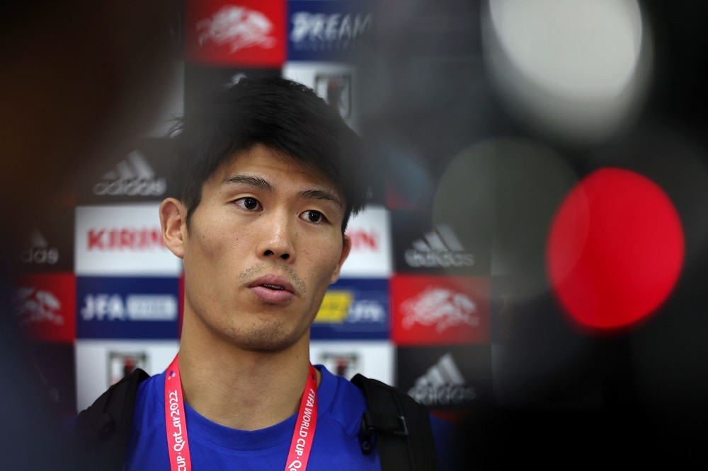 DOHA, QATAR: Takehiro Tomiyasu of Japan is interviewed during the Japan Training Session at Al Sadd SC New Training Facilities on November 25, 2022...