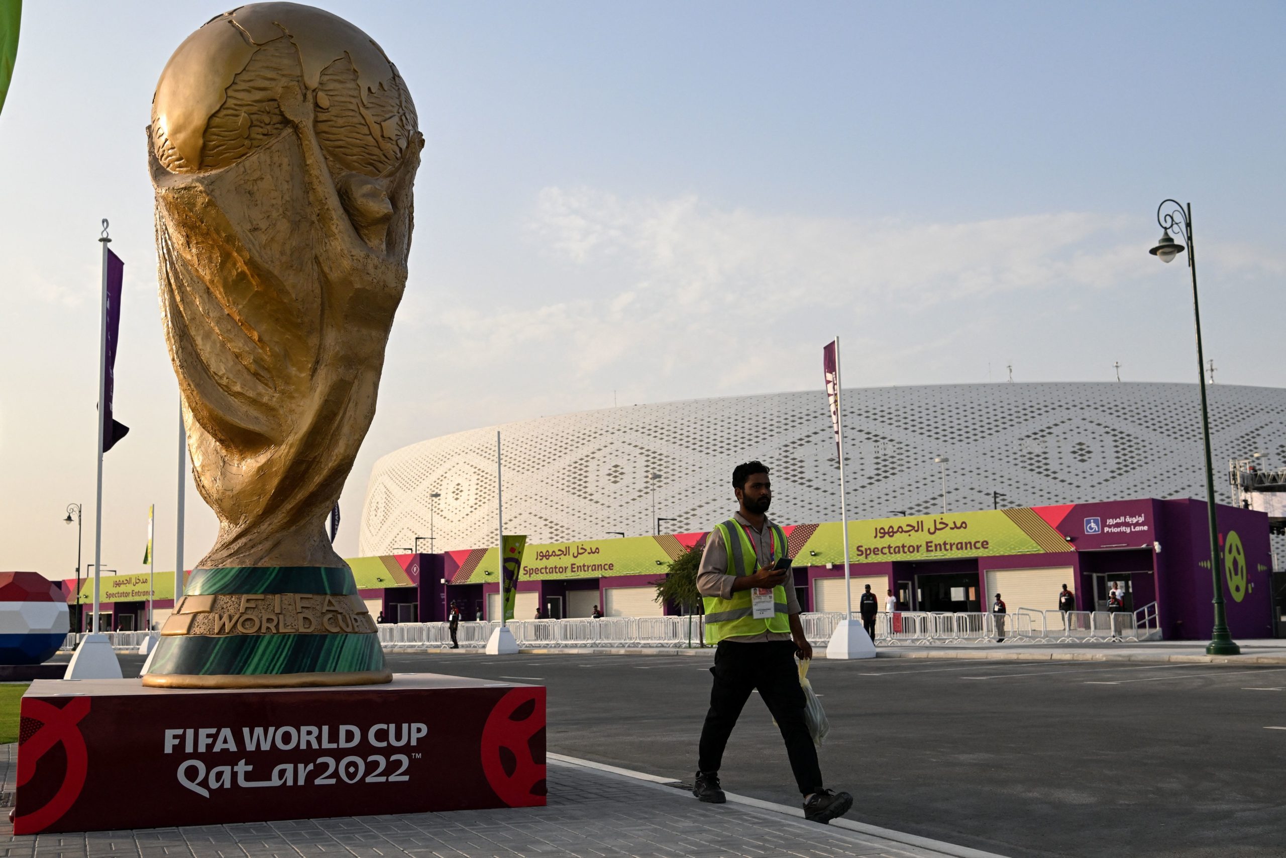Arsenal World Cup - TOPSHOT - A man walks outside the Al-Thumama Stadium in Doha on November 8, 2022, ahead of the Qatar 2022 FIFA World Cup footba...