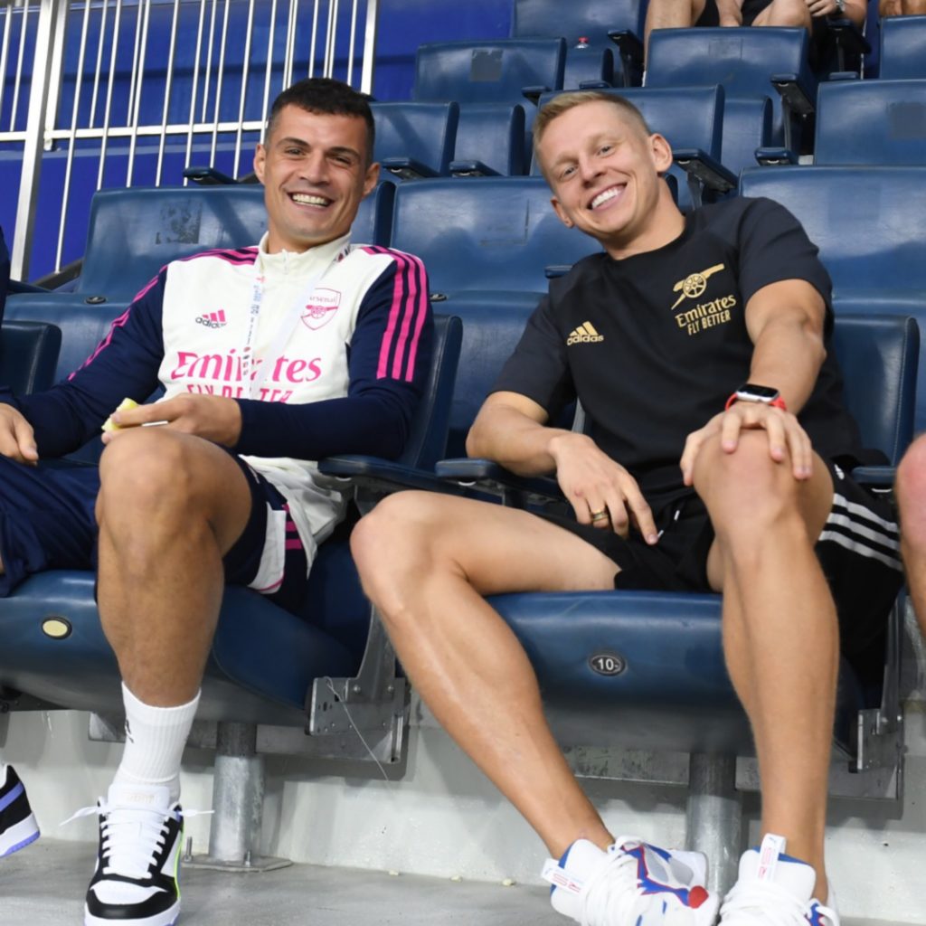 3 Arsenal internationals snapped watching Milan friendly in stands 3 Granit Xhaka and Oleksandr Zinchenko (Photo via Arsenal on Twitter)