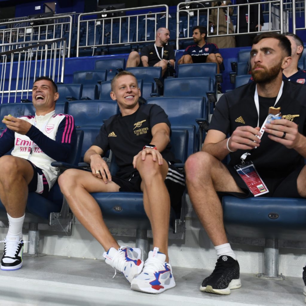 3 Arsenal internationals snapped watching Milan friendly in stands 2 Granit Xhaka, Oleksandr Zinchenko, and Matt Turner (Photo via Arsenal on Twitter)