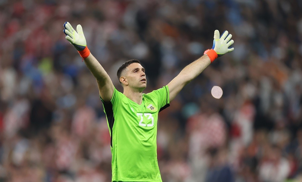 LUSAIL CITY, QATAR: Emi Martinez of Argentina celebrates the team's first goal scored by Lionel Messi during the FIFA World Cup Qatar 2022 semi-fin...