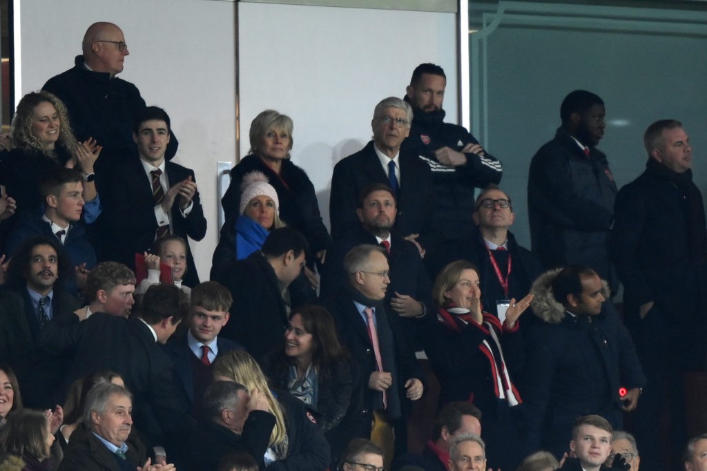 Wenger reacts to the Arsenal fans singing his song 3 LONDON, ENGLAND - DECEMBER 26: Ex Arsenal manager Arsene Wenger watches on from the stands during the Premier League match between Arsenal FC and West Ham United at Emirates Stadium on December 26, 2022 in London, England. (Photo by Justin Setterfield/Getty Images)