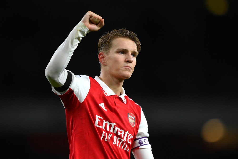 LONDON, ENGLAND: Martin Odegaard of Arsenal acknowledges the fans following the Premier League match between Arsenal FC and West Ham United at Emirates Stadium on December 26, 2022. (Photo by Justin Setterfield/Getty Images)