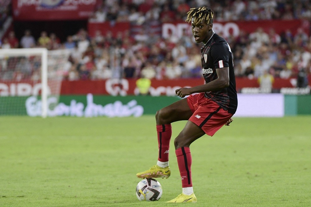 Athletic Bilbao's Spanish forward Nico Williams controls the ball during the Spanish League football match between Sevilla FC and Athletic Club Bilbao at the Ramon Sanchez Pizjuan stadium in Seville on October 8, 2022. (Photo by CRISTINA QUICLER/AFP via Getty Images)