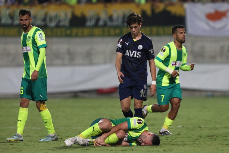 Arsenal make 2nd offer for 17yo attacking midfielder 2 Fenerbahce's Turkish midfielder Arda Guler (C, top) checks on AEK Larnaca's Israeli forward Omri Altman (C, bottom) after a foul during the UEFA Europa League group B football match between Cyprus' AEK Larnaca and Turkey's Fenerbahce at the AEK Arena in the southern Cypriot city of Larnaca on October 13, 2022. (Photo by CHRISTINA ASSI/AFP via Getty Images)