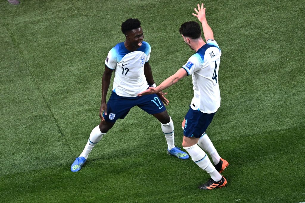 Arsenal players on international duty: Results in full 2 England's forward #17 Bukayo Saka (L) celebrates with his teammate midfielder #04 Declan Rice after scoring his team's second goal during the Qatar 2022 World Cup Group B football match between England and Iran at the Khalifa International Stadium in Doha on November 21, 2022. (Photo by JEWEL SAMAD/AFP via Getty Images)