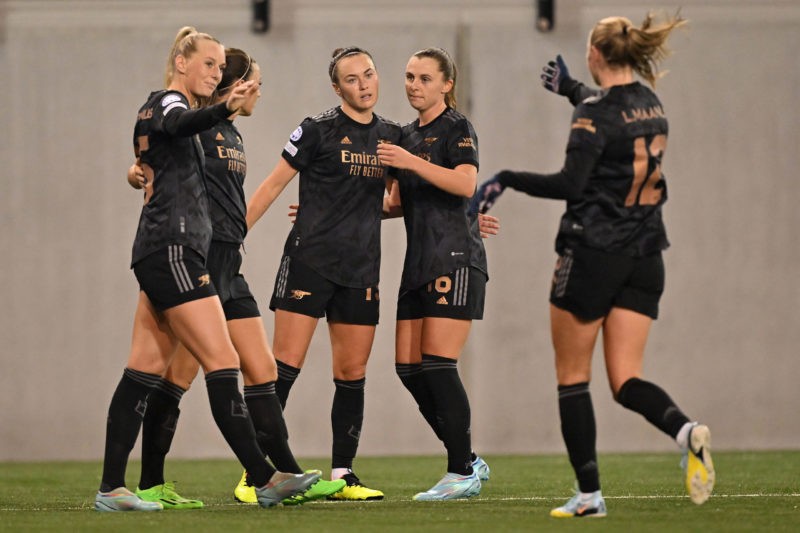 SCHAFFHAUSEN, SWITZERLAND - DECEMBER 21: Caitlin Foord of Arsenal celebrates with team mates after scoring her team's second goal of the game during the UEFA Women's Champions League group C match between FC Zürich and Arsenal at WeFox Arena on December 21, 2022 in Schaffhausen, Switzerland. (Photo by Sebastian Widmann/Getty Images)