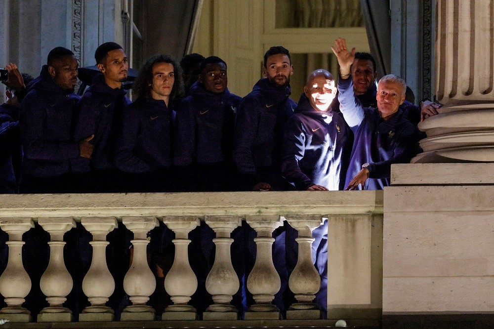 William Saliba travels to Paris after World Cup exit 2 William Saliba (2nd from left) greets supporters at the Hotel de Crillon, a day after the Qatar 2022 World Cup final match against Argentina, at the Place de la Concorde in central Paris on December 19, 2022. (Photo by GEOFFROY VAN DER HASSELT/AFP via Getty Images)
