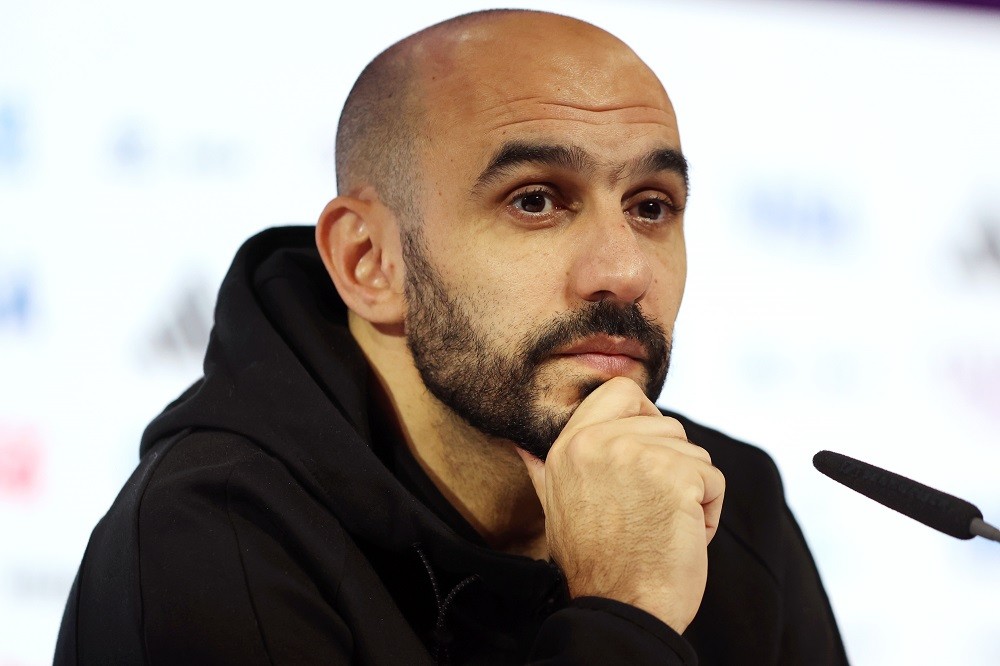 DOHA, QATAR: Walid Regragui, Head Coach of Morocco, speaks during the Morocco Press Conference at the Main Media Center on December 13, 2022. (Photo by Mohamed Farag/Getty Images)