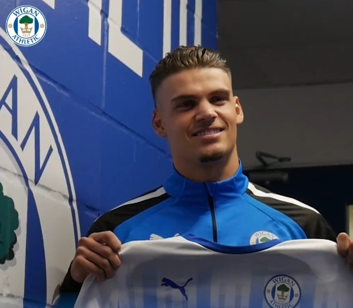 Omar Rekik after signing for Wigan (Photo via WiganAthletic.com)