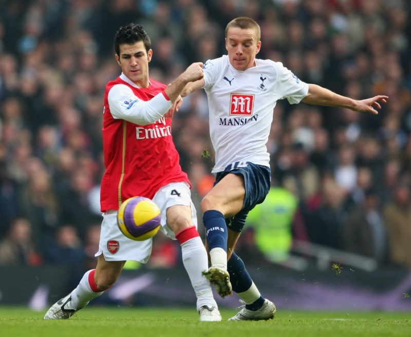 LONDON - DECEMBER 22: Francesc Fabregas of Arsenal battles with Jamie O'Hara of Tottenham Hotspur during the Barclays Premier League match between ...