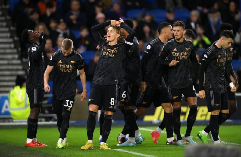 BRIGHTON, ENGLAND - DECEMBER 31: Martin Odegaard of Arsenal celebrates with teammates after teammate (L) Eddie Nketiah scores the team's third goal during the Premier League match between Brighton & Hove Albion and Arsenal FC at American Express Community Stadium on December 31, 2022 in Brighton, England. (Photo by Mike Hewitt/Getty Images)