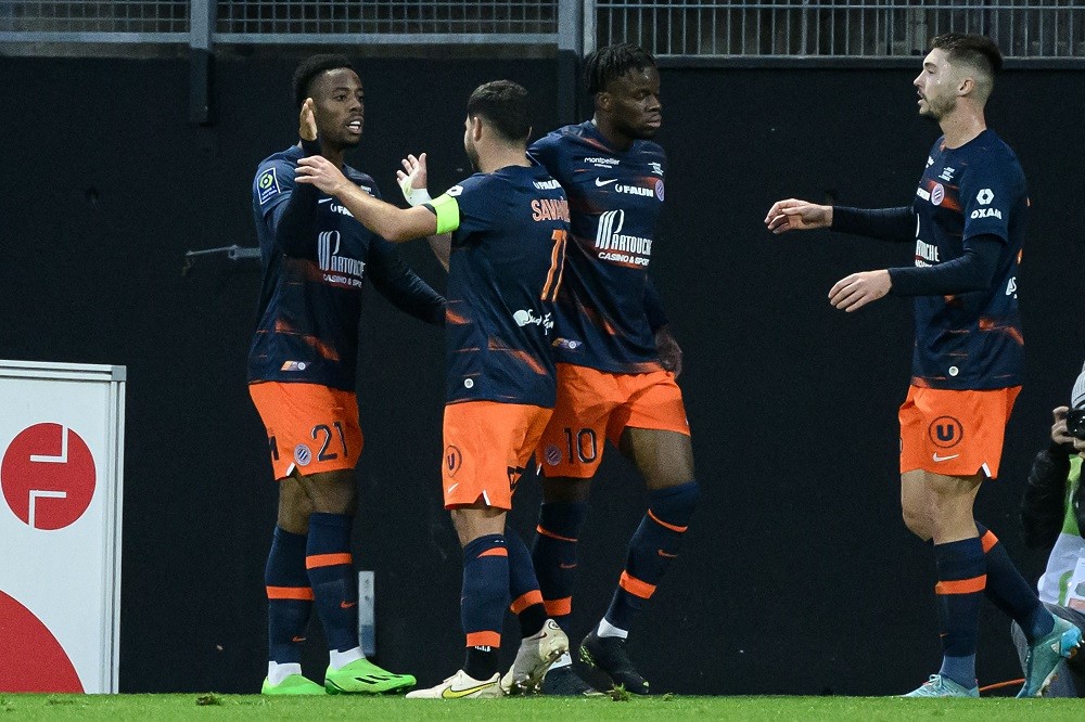 Arsenal follow 20yo French striker with 20 Ligue 1 goals 2 Montpellier's French forward Elye Wahi (L) celebrates with teammates after scoring a goal during the French L1 football match between FC Lorient and Montpellier Herault SC at the Yves Allainmat - Le Moustoir stadium in Lorient on December 29, 2022. (Photo by LOIC VENANCE/AFP via Getty Images)
