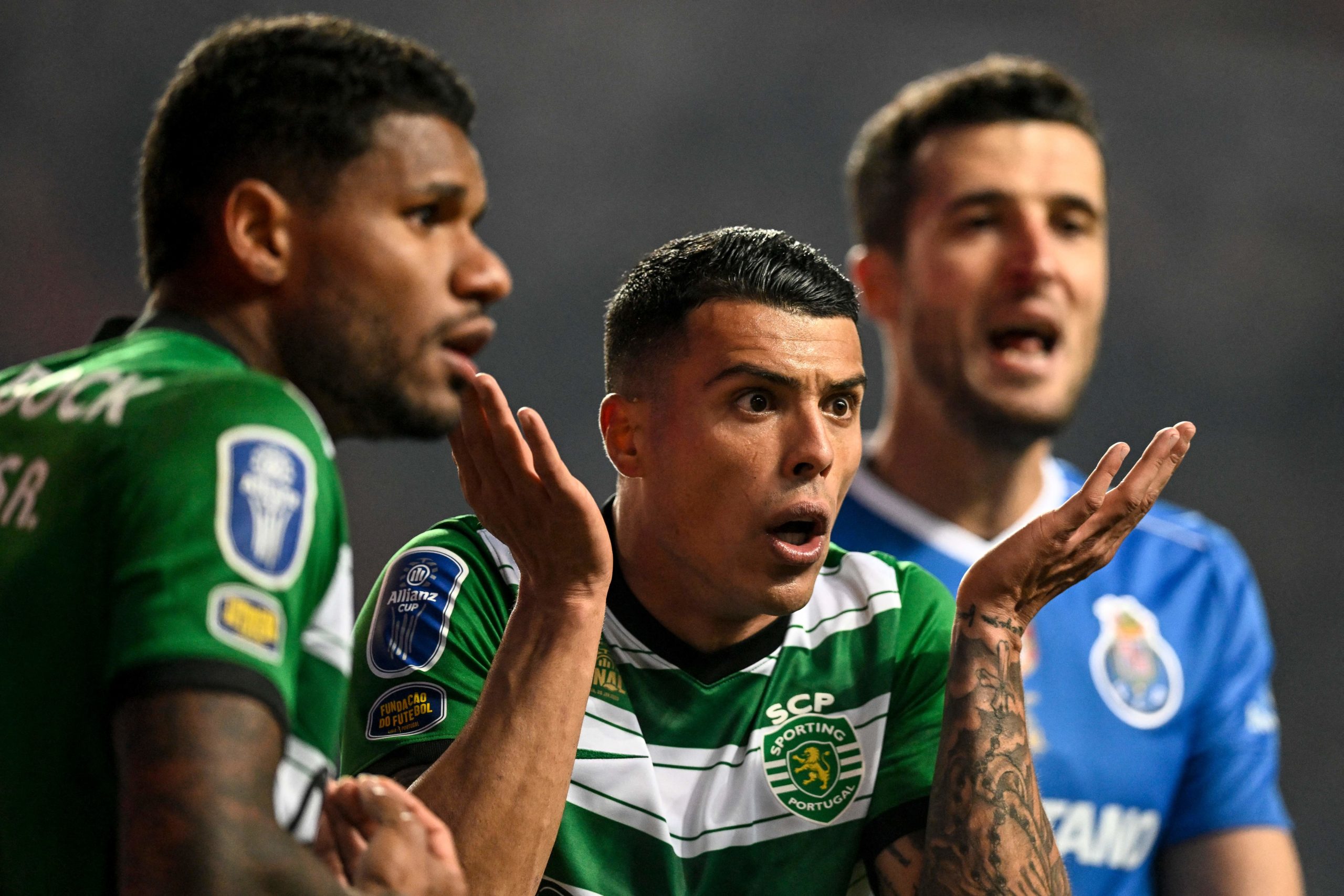 Sporting Lisbon's Spanish defender Pedro Porro (C) reacts during the Portuguese League Cup final football match between Sporting CP and FC Porto at...