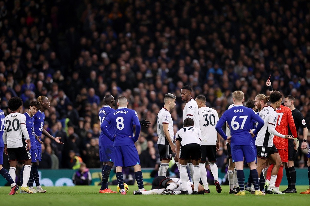LONDON, ENGLAND: Joao Felix of Chelsea (L) is shown a red card by referee David Coote (R) during the Premier League match between Fulham FC and Chelsea FC at Craven Cottage on January 12, 2023. (Photo by Ryan Pierse/Getty Images)