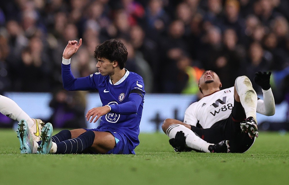LONDON, ENGLAND: Joao Felix of Chelsea looks on as Kenny Tete of Fulham lies injured following a tackle that resulted in a red card during the Premier League match between Fulham FC and Chelsea FC at Craven Cottage on January 12, 2023. (Photo by Ryan Pierse/Getty Images)