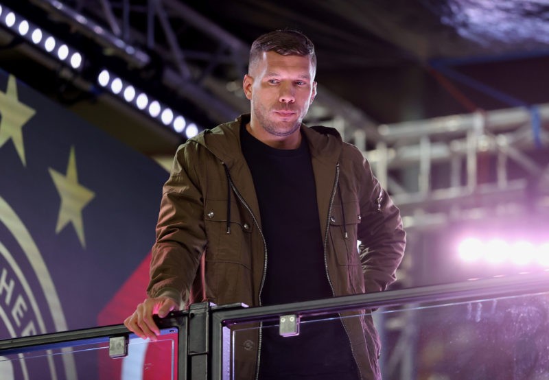 COLOGNE, GERMANY - OCTOBER 07: Former German national player Lukas Podolski seen on the TV platform prior to the international friendly match betwe...