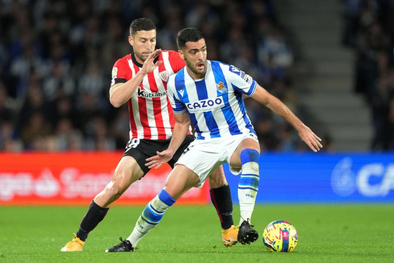 SAN SEBASTIAN, SPAIN - JANUARY 14: Martin Zubimendi of Real Sociedad is challenged by Oscar de Marcos of Athletic Club during the LaLiga Santander ...