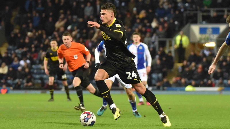Omar Rekik playing for Wigan Athletic (Photo via WiganAthletic.com)